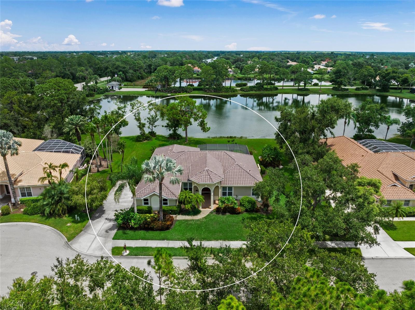 ONE OF A KIND PRIVATE SETTING * LOCATION, LOCATION, LOCATION * This Executive Family Home features PANORAMIC VIEWS OF A VERY LARGE LAKE * THESE ARE MUST SEE VIEWS * NO HOME BEHIND YOU and NO HOME ACROSS THE STREET FROM YOU * Cul de sac lot - no through traffic * VERY PRIVATE GREENBELT * Almost 1/2 ACRE Estate Lot * You'll notice the PRIDE OF OWNERSHIP in this IMMACULATE HOME BEHIND THE GATES OF MISTY CREEK * NEW TILE ROOF 2024 * NEW PGT IMPACT GLASS WINDOWS & DOORS * Aquarium window and front door have shutters * LOVINGLY RENOVATED Kitchen with UPGRADED APPLIANCES including a Double Oven, Cook-top, Granite Counters and Wood Cabinets * The Chef's Kitchen is open to the SPACIOUS Living Room & Formal Dining Room * 3 Bedrooms PLUS a Den/Office * The Primary Suite features a Spa-style Bath with Walk-in Shower, Garden Tub, Dual Vanities with NEW Granite Counters, and 2 Walk-in Closets * Split Plan Design * Volume Ceilings with Crown Molding * 8 foot Sliding Glass Doors * All of this wraps your Outdoor Living with HEATED POOL & SPA * LARGE COVERED LANAI * THIS IS A FABULOUS POOL HOME * Perfect for entertaining friends & family or simply relaxing in your slice of paradise * 3 Car Garage * Yard Well for Irrigation * Mature Landscaping * BEAUTIFUL VIEWS *
Gated community with 24/7 security * Misty Creek is including 1 month FREE golf membership with the sale of this home * If you have any questions, Listing Agent lives in Misty Creek * Golf membership is NOT mandatory * Low annual HOA fees * Country feel yet minutes to Siesta Key Beach, excellent schools, shopping & dining * Rothenbach Park & New Publix shopping plaza is 5 minutes away * 'A' RATED SCHOOL DISTRICT * One look & you'll fall in love! *