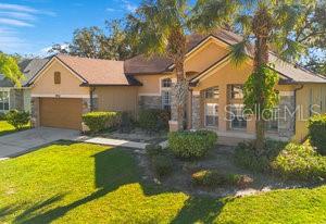 Under contract-accepting backup offers. " PRICE IMPROVEMENT " EMBRACE THE SUNSHINE LIFESTYLE IN YOUR EXQUISITE FLORIDA HOME" NEW ROOF 2019 NEW HVAC 2017 Located in The Oaks, a pristine golf course community in Southwest Kissimmee, situated near conservation areas, major destination attractions, and the historic downtown center. Live the premiere golf and country club lifestyle without the high dues and mandatory investments! This spacious 4 bedrooms 3 bathrooms pool home is tucked away and surrounded by mature landscaping, lending a private, restful ambiance to the oversized screened lanai. Inside, the family room, breakfast area, and kitchen feature the open-concept design which makes entertaining a pleasure. The separate formal living and dining rooms create an atmosphere of elegance to the home, and are perfect for larger gatherings, or to create "bonus" spaces like game rooms or work-from-home office spaces - the possibilities are endless! Enjoy your cozy gas fireplace while gazing through the many oversized windows to the tree line surrounding the back of your property. The home features new stainless appliances, hard-surface flooring throughout, stone countertops, ceiling fans, a split-bedroom design, two car attached garage, charming lap or lounge pool, and a storage shed. This home can become a refuge from the hustle and bustle of everyday life, all while situated in the middle of everything that Kissimmee and Celebration are known for! A great home, a great location, a great opportunity.