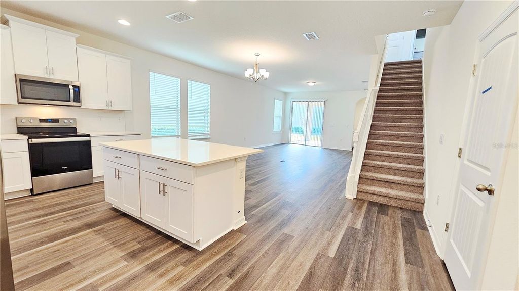 Photo of 16013 Ridge Haven Alley, Winter Garden, FL 34787 (MLS # O6369628)