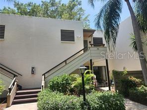 Wildwood Spring is a highly sought after community. Nice second floor unit overlooking the gardens and community pool. Upgraded Stainless appliances in the kitchen and granite counter tops. Laundry closet for stack washer/dryer will be installed before move in by landlord. Recently interior was painted throughout.. Large living room/dining room combo with large enclosed lanai for extra square footage which also has a huge closet for bicycles or storage. Master bedroom is very large with a wall of closets. Bathrooms have been updated with new vanities, granite tops and new toilets. Split bedroom floor plan with 2nd bedroom in the front of the unit and master is in the rear overlooking the garden. Community pool is within a short distance and tennis courts around the corner. Wildwood Springs has multiple pools throughout this beautiful landscaped community. Onsite management company. Cable, Internet, water, pest control, sewer and trash included.