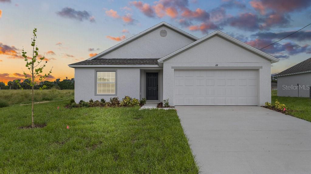 BRAND NEW CONSTRUCTION! Welcome to this beautiful 3-bedroom, 2-bathroom home located in the charming community of Frostproof, FL. Be the very first to live in this thoughtfully designed home featuring an open floor plan, spacious living areas, and modern finishes throughout.
The kitchen is the heart of the home, offering plenty of cabinetry, sleek countertops, brand-new appliances, and a large island for everyone to gather around. The owner’s suite includes a private bath and generous walk in closet space, while the additional bedrooms provide comfort for family or guests.
Enjoy the convenience of an a two-car garage, and a layout that makes daily living effortless. Step outside and take in the peaceful surroundings. No neighbors across the street… or behind you. Instead, your backyard borders a 10-acre vacant parcel, a rare opportunity for seclusion. Perfect for creating your own outdoor oasis, adding a garden, or simply relaxing in the Florida sunshine.
Located just a short drive from Lake Clinch and Lake Reedy, you’ll have easy access to fishing, boating, and scenic views. Plus, you’re within reach of Avon Park, Lake Wales, and only about 90 minutes from the beaches and Orlando attractions.
If you’re looking for a move-in ready home in a quiet yet convenient location, this is the one. Schedule your showing today and make this brand-new house your home!