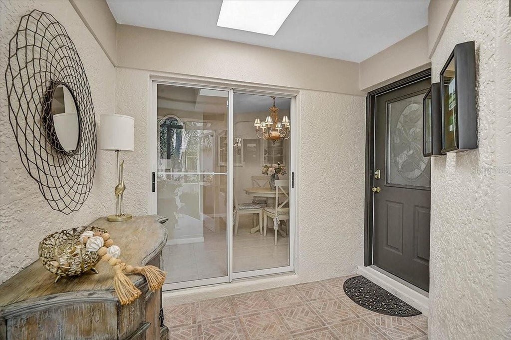 Photo of 4238 Caddie Drive E, Bradenton, FL 34203 (MLS # A4707383)