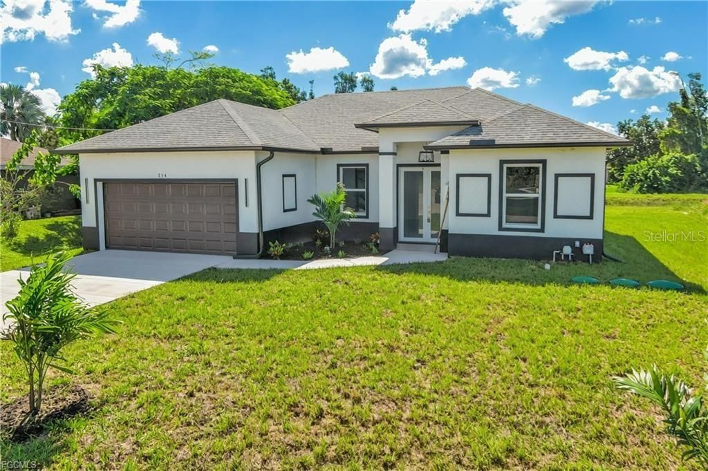 Photo of 114 Preston Street, Lehigh Acres, FL 33974 (MLS # O6392899)