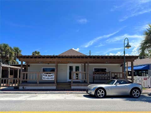 Photo of 411 Flagler Avenue, New Smyrna Beach, FL 32169 (MLS # NS1088659)