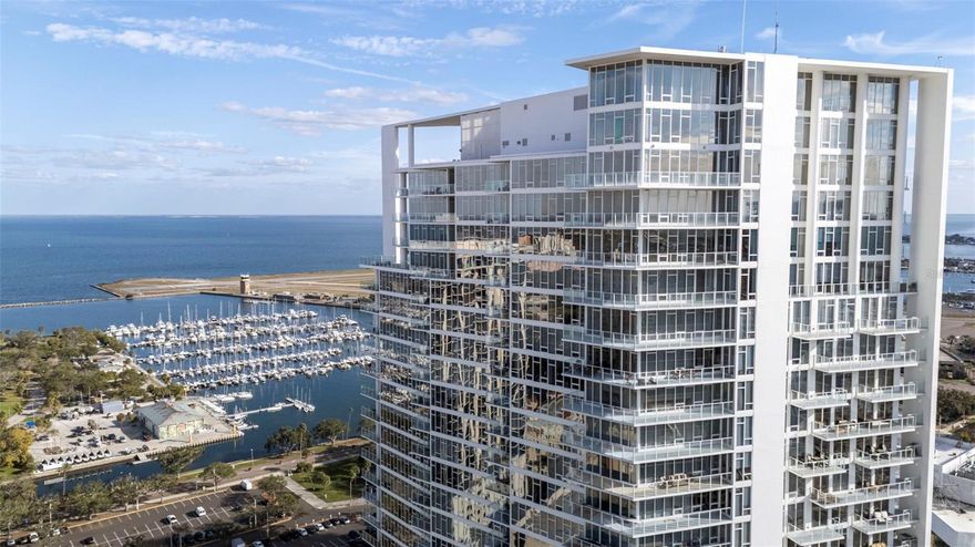 Luxury living meets unbeatable downtown convenience at Signature Place. Unit 1604 offers 1,018 square feet of thoughtfully designed space with two bedrooms and two bathrooms, paired with one of the largest terraces available in the building for this floor plan, perfect for indoor and outdoor living, entertaining, or simply enjoying breathtaking water views, city views, sunrises, and sunsets.

The open kitchen features premium Thermador appliances, a Bosch dishwasher, Italian cabinetry, and quartz countertops, and flows seamlessly into the living area. The living area and primary bedroom are enhanced with electric shades for comfort and privacy. A washer and dryer are included for everyday ease. This residence also comes with two parking spaces ideally located steps from the elevator, a rare and valuable convenience in downtown living.

Signature Place delivers resort style amenities including a pool, social and club room, pool table, and a fully equipped fitness center. Located in the heart of downtown St. Petersburg, you are moments from world class dining, shopping, waterfront parks, and vibrant cultural attractions.

This is a rare opportunity to own a well located luxury condo with exceptional outdoor space and parking in one of downtown’s most desirable buildings. Ideal for full time residents, second home buyers, or anyone seeking the best of the St. Pete lifestyle. Request your showing today!