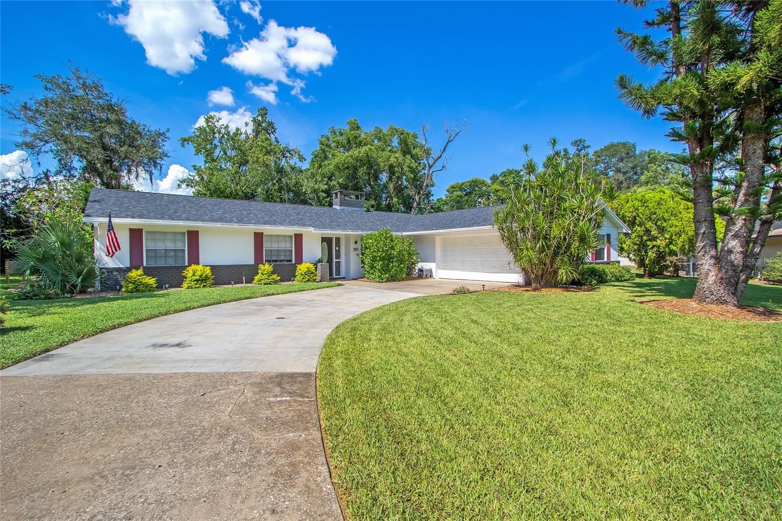 Beautifully Renovated 4-Bedroom Home in Mount Dora, FL – Move-In Ready! Welcome to your dream home in the heart of Mount Dora, Florida! This beautifully updated 4-bedroom, 2.5-bathroom home offers 1,824 square feet of stylish living space, packed with upgrades that provide both comfort and peace of mind. From the moment you arrive, you’ll notice the fresh exterior paint and charming curb appeal. Step inside to find brand-new floors throughout and freshly painted interiors that create a warm, modern atmosphere. The remodeled bathrooms feature updated fixtures and finishes that add a touch of luxury to your daily routine. The kitchen is a true standout, complete with granite countertops, Samsung Bespoke appliances, and plenty of cabinet space—perfect for cooking and entertaining. Cozy up in the living room with an electric fireplace or in the family room with a wood burning fireplace, creating the ideal setting for any occasion. Major system updates include a new roof (2023), updated electrical (2023), new AC (2025) and a new hot water heater (2025), giving you peace of mind for years to come. Outside, enjoy your private backyard retreat featuring a garden boxes ready for your favorite vegetables or flowers. Whether you’re relaxing with family or entertaining friends, this home checks all the boxes. Located just minutes from historic downtown Mount Dora’s shops, dining, and events, this home blends small-town charm with modern convenience. Don’t miss your chance to own this fully upgraded gem—schedule your private showing today!