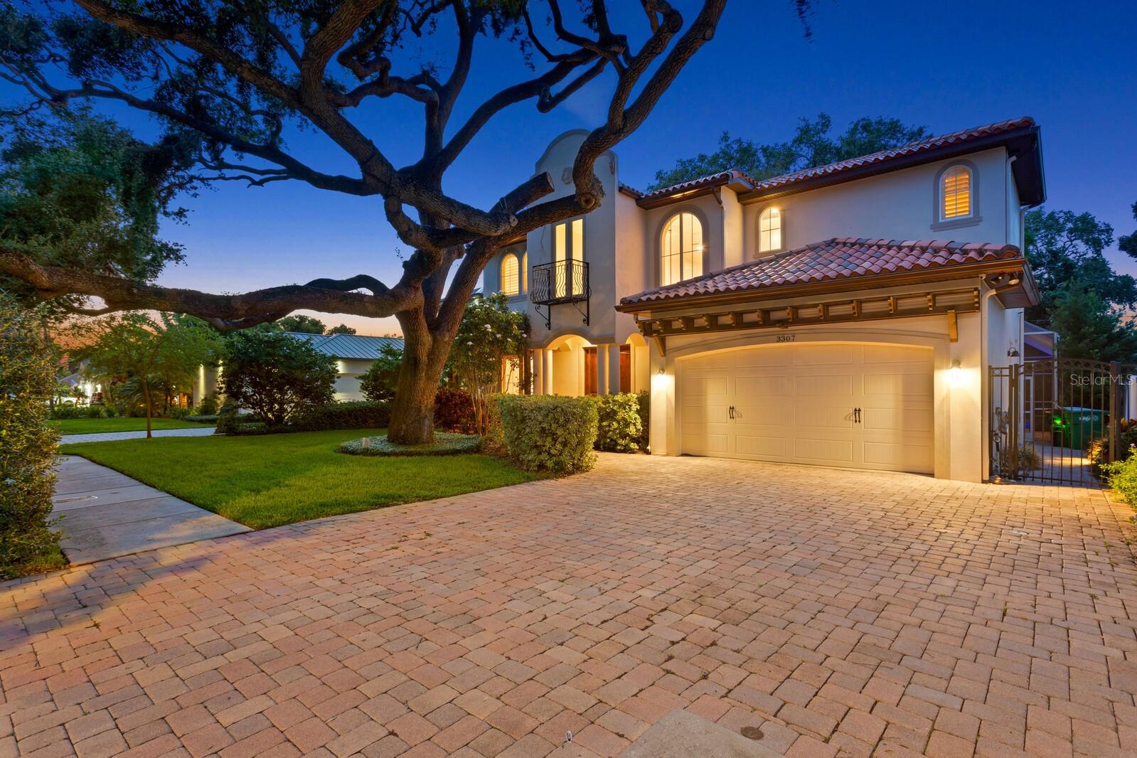 Welcome to your dream home—ideally located in the renowned and highly desirable Bayshore Beautiful neighborhood, just a short stroll from the iconic Bayshore Boulevard. This impeccably maintained Mediterranean-style pool home blends timeless elegance with everyday comfort, offering the perfect sanctuary for modern living.
With 5 generously sized bedrooms, 4.5 baths, plus two dedicated offices (one on each level) featuring custom built-ins, this home is thoughtfully designed for flexibility—ideal for professionals working from home, multi-generational families, or those simply craving more space. There is a first floor en-suite bedroom that’s perfect for guests or in-laws. A spacious 2-car garage provides added convenience and ample storage.
Step through grand double doors into a stunning two-story foyer, where soaring 10-foot ceilings, 8-foot doors, newly refinished hardwood floors, crown molding, and coffered ceilings set an elegant tone throughout the main floor. At the heart of the home is a gourmet chef’s kitchen, featuring granite countertops, 42-inch cabinetry, stainless steel appliances with a gas range, walk-in pantry, and an oversized island perfect for gathering. The open-concept design connects the kitchen to a spacious living spaces and casual dining area creating a seamless flow for everyday living and entertaining alike.
Additional main-floor highlights include a cozy fireplace in the formal living room, a well-appointed office, powder room, and a practical laundry/utility room. Upstairs, a charming study offers a perfect nook for reading, relaxing, or working. Retreat to the luxurious primary suite, complete with a fully renovated spa-like bathroom, dual vanities, a soaking tub, walk-in shower, his and her closets.
Each additional upstairs bedroom is designed with comfort and versatility in mind—two share a convenient Jack-and-Jill bath, while another enjoys a private en-suite.
Step outside to your own private backyard oasis. Unwind by the sparkling pool, relax on the covered patio, gather around the built-in fire pit—perfect for cozy evenings under the stars or practice your swing on the personal putting green—all set against the backdrop of Florida’s year-round sunshine.
Situated in the coveted Plant High School District and just minutes from Downtown Tampa, upscale shopping, dining, and the waterfront sidewalk of Bayshore Boulevard, this move-in ready home offers an unmatched combination of location, luxury, and lifestyle.
Don’t miss your opportunity to own one of Bayshore Beautiful’s most exceptional homes.