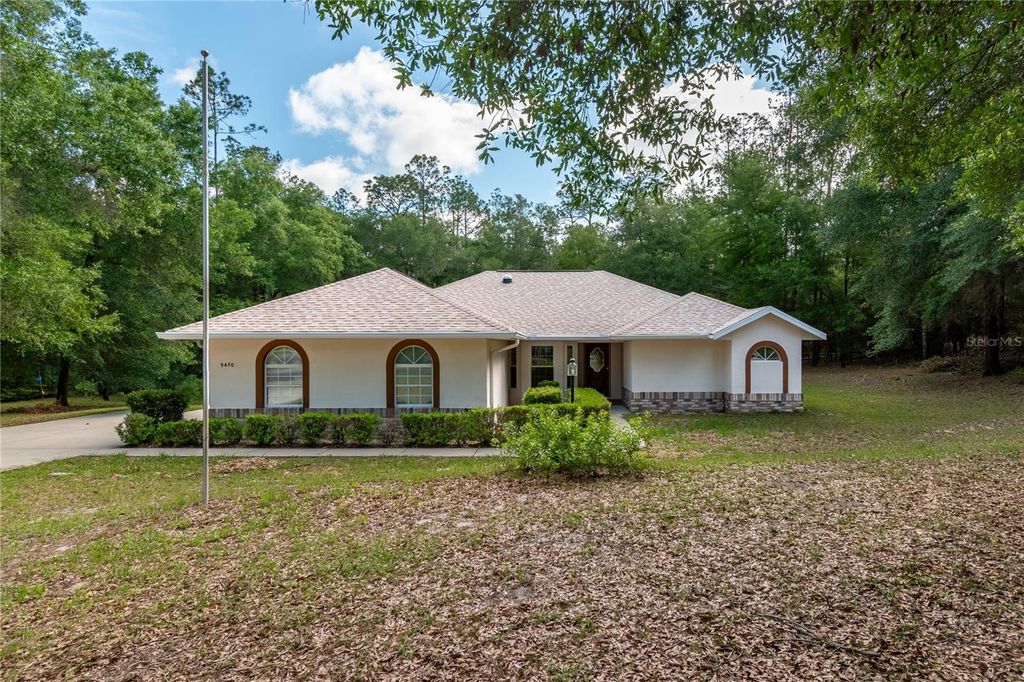 Photo of 9450 SW 208th Circle, Dunnellon, FL 34431 (MLS # OM724940)
