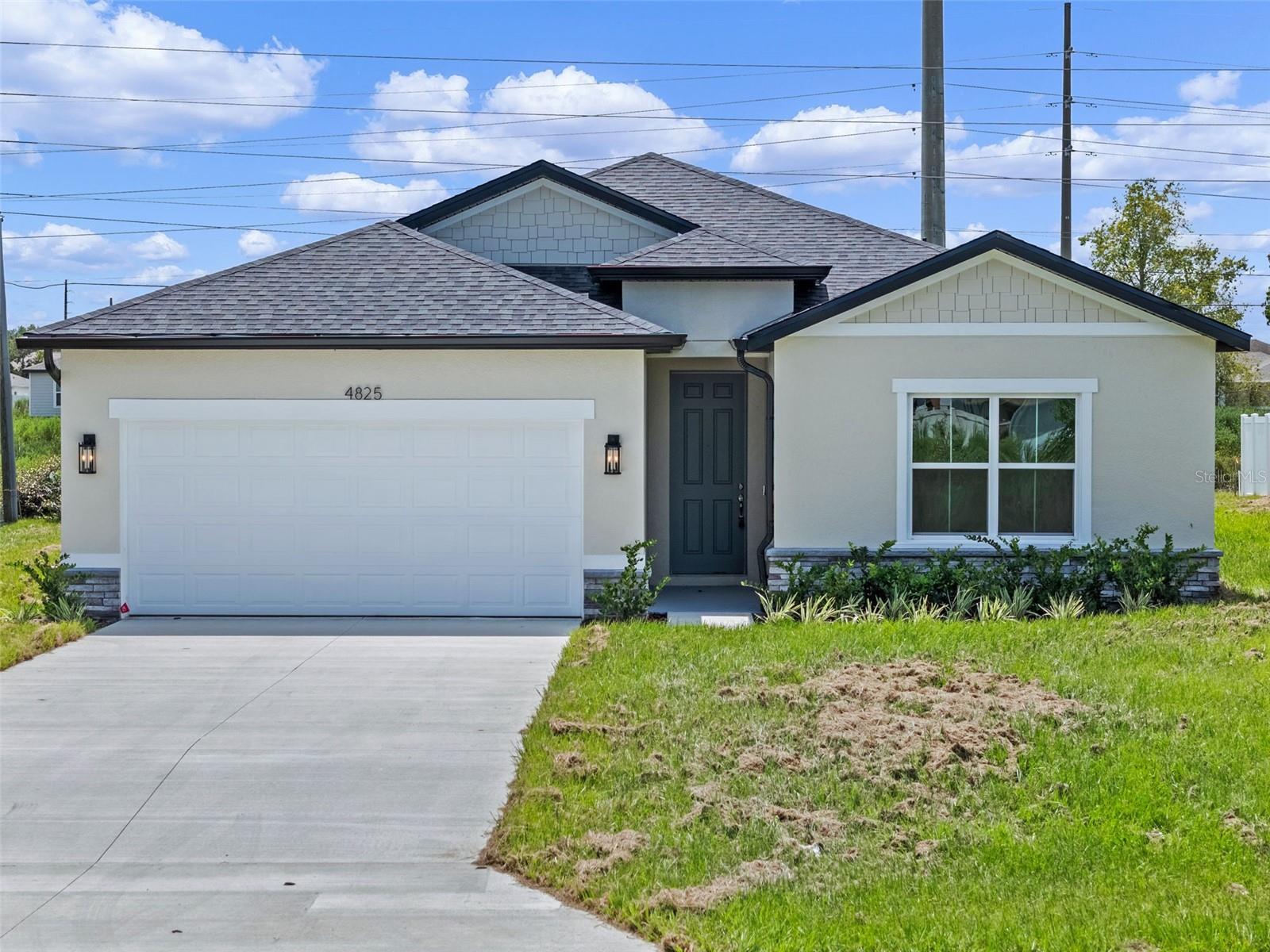 2025 NEW BUILD with 4 BEDROOMS 3 BATHROOMS + 2 Car Garage + 1/4 ACRE with 1,990 square feet of living space. This BRAND NEW HOME features an open concept THREE WAY SPLIT PLAN with beautiful finishes throughout. The kitchen is complete with QUARTZ COUNTERTOPS, HERRINGBONE SUBWAY TILE BACKSPLASH, crown molding with staggered GRAY SHAKER CABINETS, hardware and faucet, oversized pantry, and large kitchen island with bar top seating. The kitchen opens to the living room area with tons of natural light. The primary bedroom has a tray ceiling, LARGE HIS & HERS WALK IN CLOSETS. The primary bathroom has a QUARTZ DUAL VANITY, along with a GLASS SHOWER ENCLOSURE WITH FLOOR TO CEILING TILE AND SHOWER NICHE. At the front of the home is a FULL BEDROOM AND EN SUITE perfect as a GUEST OR MOTHER-IN-LAW SUITE! Two bedrooms and another full bathroom are located down a hallway. The laundry room has a Brand New Washer & Dryer. This new construction home has Luxury Vinyl Plank flooring! Call to make an appointment to see this home today! PUBLIC WATER & SEWER. Builder Preferred Lender is Offering 1% of Closing Costs!