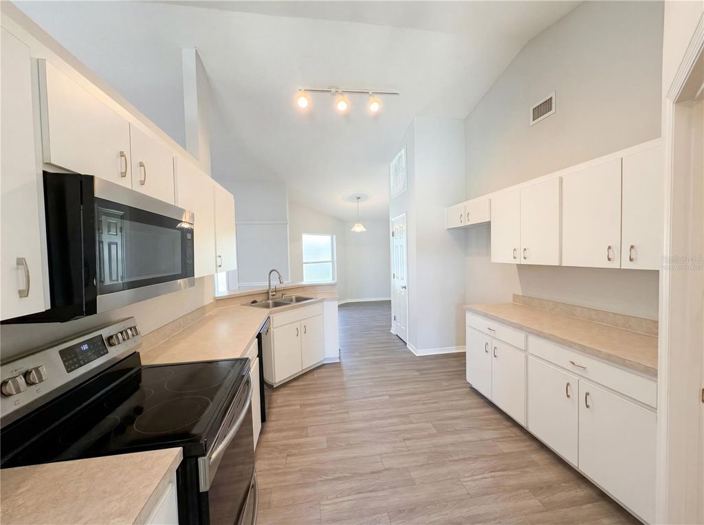 Photo of 6371 Hampton Pointe Circle, Lakeland, FL 33813 (MLS # O6393250)