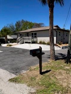 Two bedroom/two bath renovated home on elevated lot in Nokomis, so close to everything! Open living/dining room with sliders out to huge screened in porch along the entire back of the house. Full kitchen with bar counter. Opens to vaulted ceiling dining and living area full of light. Split floorplan with master suite on one side, large walk-incloset, separate sink area in bathroom and walk-in shower. Guest room has one large closet. Full bath with tub. Laundry Room with washer and dryer. Sunny front porch deck. Property has plenty of parking for your boat or RV. Legacy trail is a half block away, as well as a kayak ramp. Great, clean solid home. Five minutes to the wonderful restautants and shopping in downtown venice - or the Venice public boat launch.
Annual rental available furnished or unfurnished.