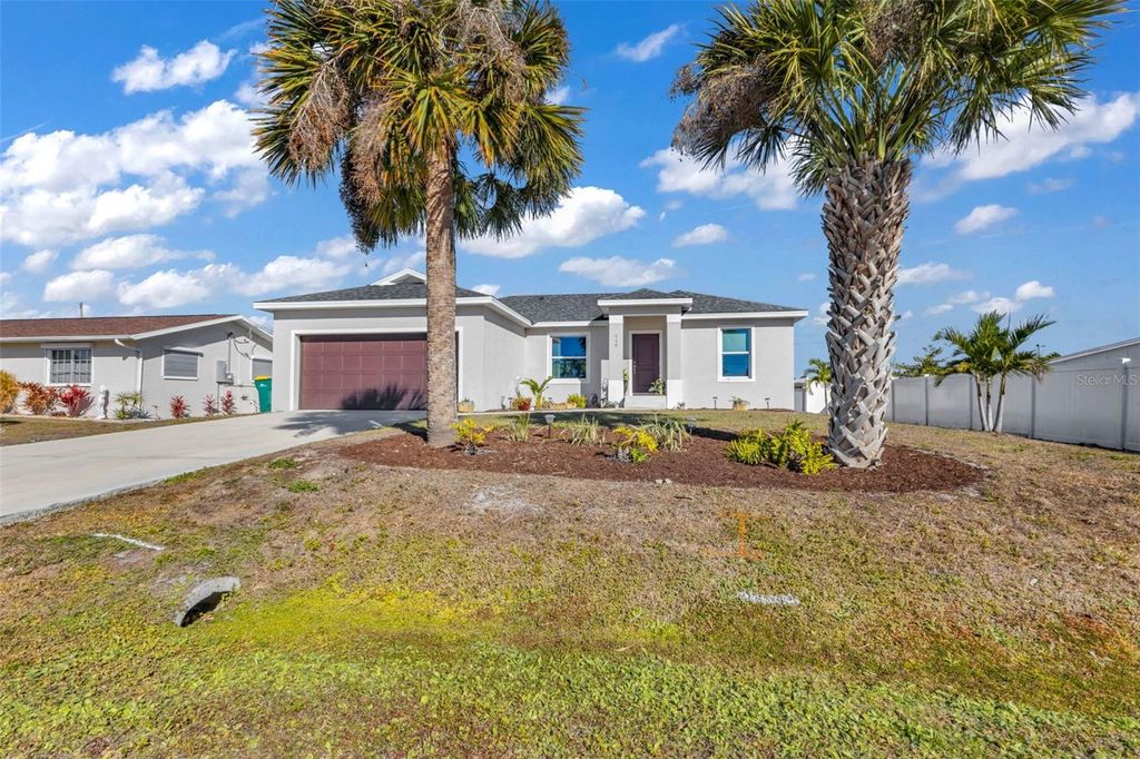 Photo of 410 Garfield Avenue NW, Port Charlotte, FL 33952 (MLS # C7520480)