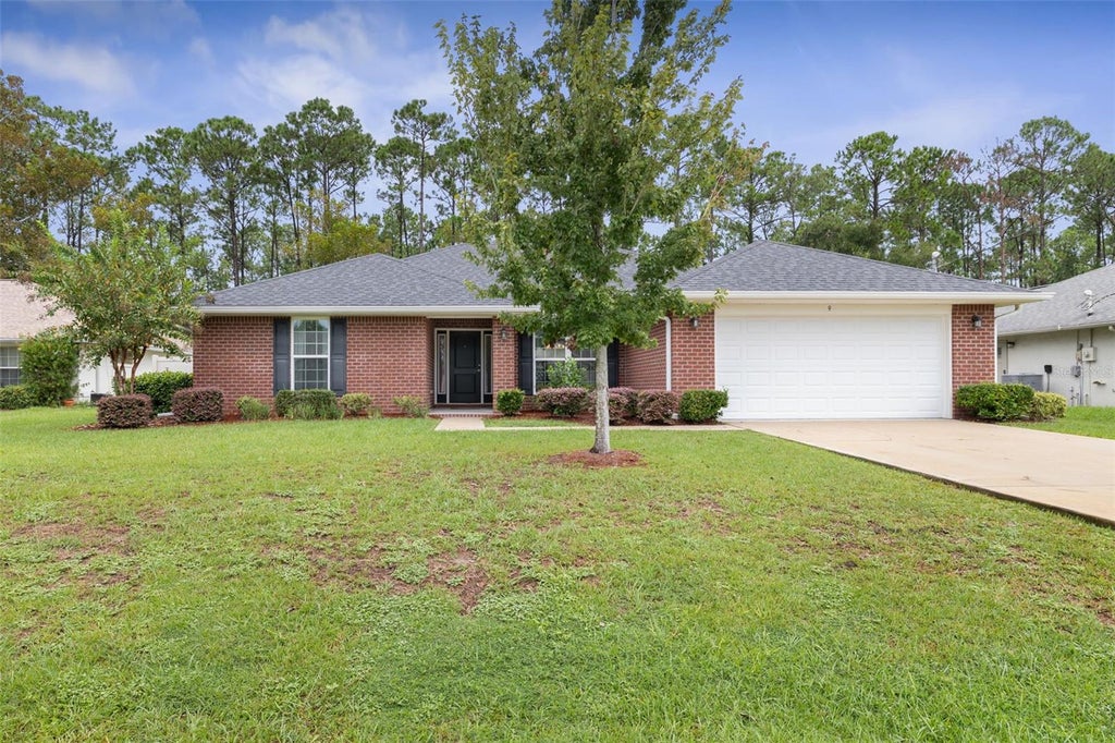 Photo of 9 Barrister Lane, Palm Coast, FL 32137 (MLS # FC321927)
