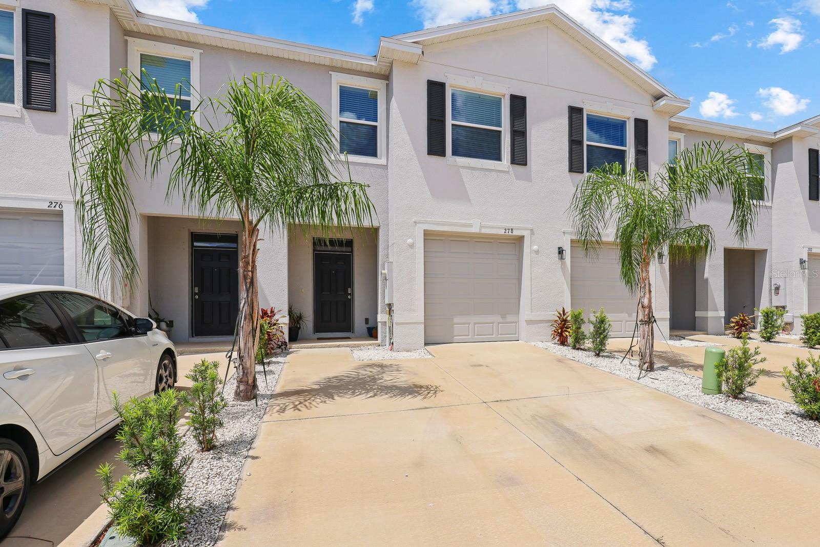 Welcome to this beautifully maintained 3-bedroom, 2.5-bathroom townhome located in the Mangrove Point in Apollo Beach. Nestled in a quiet and desirable neighborhood, this home offers a perfect blend of comfort, convenience, and community amenities. Featuring a 1-car garage and numerous updates, this property is move-in ready and designed for modern living.
Step inside to discover a spacious open-concept first floor adorned with durable ceramic tile flooring throughout. The expansive living room flows seamlessly into a dedicated dinette area, ideal for both casual meals and entertaining guests. The kitchen is a true highlight, featuring an oversized island, granite countertops, and a full appliance package that includes a refrigerator, range, dishwasher, and microwave. A large walk-in pantry provides ample storage space for all your kitchen essentials. Triple sliding glass doors at the rear of the home open to a covered and screened lanai creating a perfect space for enjoying your morning coffee or unwinding in the evening.
Upstairs, all three generously sized bedrooms are thoughtfully situated for privacy and comfort. Each bedroom features cozy carpet flooring, while both full bathrooms are finished with durable ceramic tile. The primary suite is located at the rear of the home and boasts two spacious walk-in closets and a private en-suite bathroom complete with a large shower and a dual sink vanity. Bedrooms 2 and 3 are positioned at the front of the home and share a full bathroom with a tub/shower combination. A conveniently located laundry closet on the second floor adds to the home's functional layout.
The home is prewired for a doorbell camera, security system, and other “smarthome” components provided by the builder (all brand new and unopened in original boxes ready for installation).
Residents of Mangrove Point enjoy access to wonderful community amenities including a sparkling pool and clubhouse. HOA fees include water, sewer, lawn care, and landscaping maintenance, making for low-maintenance living. Ideally located just off Highway 41 and minutes from I-75, this home offers an easy commute to Tampa and surrounding areas. You'll also find a wide variety of shopping, dining, and entertainment options nearby.