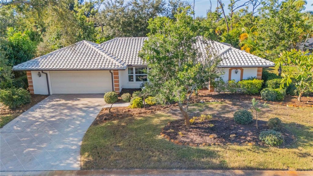 Photo of 209 Woodland Drive, Englewood, FL 34223 (MLS # N6141986)