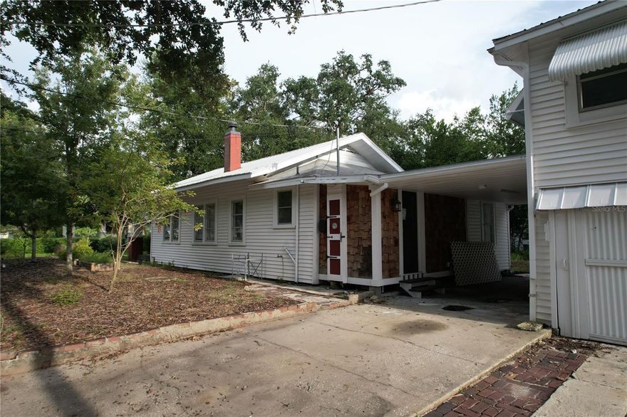Charming remodeled bungalow for rent: 1-bedroom, 1-bath home in Tampa with a fenced yard. Conveniently located near shopping, restaurants, and the interstate. $150 a month for electricity, water, internet, and lawn.