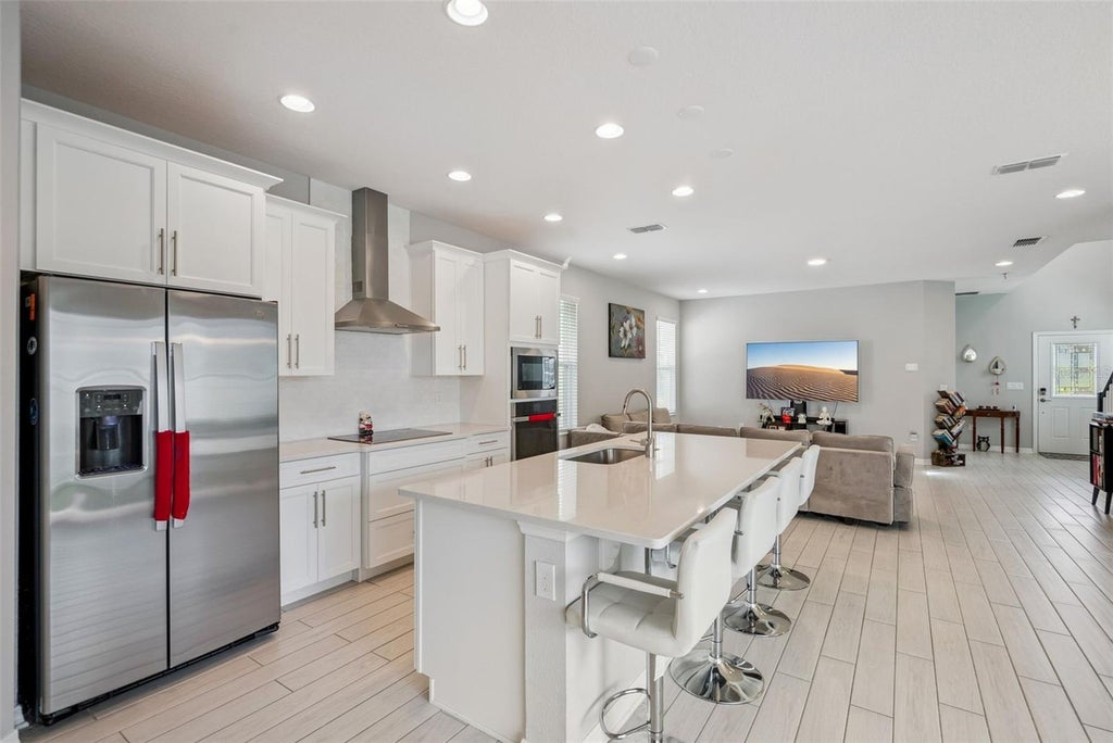 Photo of 613 Cheval Lane, Debary, FL 32713 (MLS # O6441909)