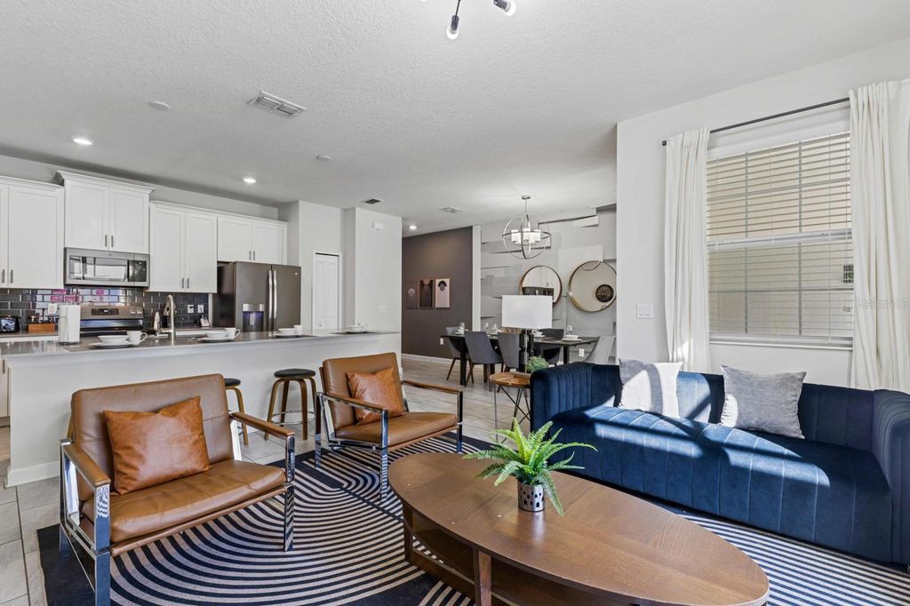 Photo of 8990 Stinger Drive, Champions Gate, FL 33896 (MLS # O6351210)