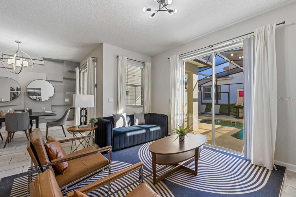 Photo of 8990 Stinger Drive, Champions Gate, FL 33896 (MLS # O6351210)