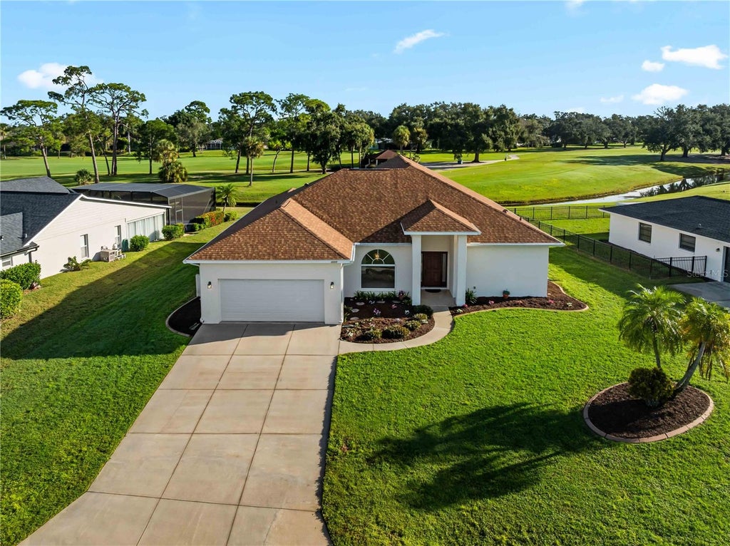 Photo of 5121 Palm Aire Drive, Sarasota, FL 34243 (MLS # A4707559)