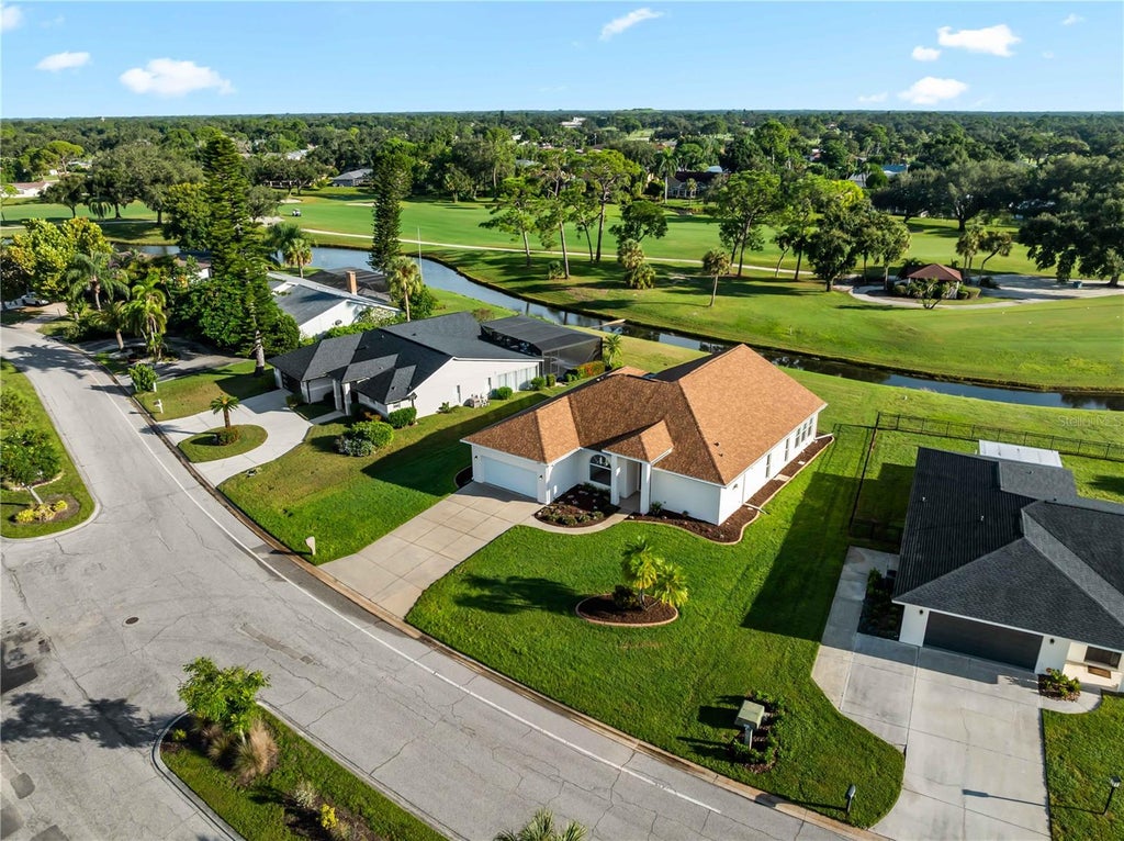 Photo of 5121 Palm Aire Drive, Sarasota, FL 34243 (MLS # A4707559)