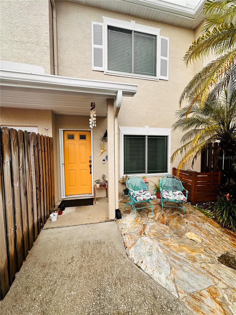 ASK ABOUT SELLER INCENTIVES! More Photos Coming Soon. Welcome to your private oasis in the heart of Tampa! Situated on a tranquil cul-de-sac in the highly desirable Lake Pointe of Pebble Creek community, this stunning townhome offers a blend of elegance and modern comfort. This residence features 2 bedrooms, 2.5 bathrooms, and a 1-car garage, spanning over 1,054 heated square feet. The charming entryway provides a private, fenced courtyard, perfect for outdoor entertaining or for your furry friends. Inside, the immaculately maintained, open-concept floor plan is filled with natural light and features a spotless kitchen with stainless steel appliances. Step outside to a screened-in lanai with a breathtaking view of the serene pond and mature trees. The private primary suite also offers a secluded balcony with a premium pond view, perfect for morning coffee. This townhome offers the best location and price in New Tampa. With NO CDD fee and a LOW HOA. Enjoy the relaxing amenities, this opportunity does not come along often. It is a prime location near I-75, I-275, USF, multiple hospitals, Wiregrass Mall, and the new KRATE Shops. Roof 2018, A/C 2017, Water Heater 2022, 2021 Double-Pane, Energy-Efficient Windows, 2021 Garage Door, Water Softener, Washer and Dryer included. Don't miss this rare find—schedule your ShowingTime appointment today!