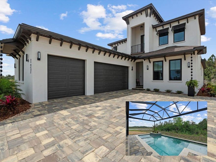 This stunning Hulbert Homes model in Veranda Bay isn’t just beautifully designed—it’s thoughtfully built with purpose and luxury in mind. Every finish, fixture, and layout choice reflects the ease and elegance of coastal living, all set on a spacious 60x130 lot with a heated saltwater pool by Collins Built Pools.

On the main level, you’ll find an open-concept kitchen with a hidden pantry, Matte finish and rose gold accent Cafe Appliances, and a gas stove powered by a buried 250-gallon propane tank—perfect for serious cooks. The living and dining areas flow seamlessly beneath 10-foot ceilings with a custom 8-inch stepped ceiling and inlay detail. Sliders lead out to a peaceful outdoor space ideal for entertaining.

The primary suite is privately tucked off the main living area and includes dual closets, brushed gold fixtures, and a luxurious en suite with a separate soaking tub and shower. A home office and convenient first-floor laundry (with washer and dryer included) round out the downstairs.

Upstairs, enjoy a versatile loft or game room with access to a private balcony, along with two additional bedrooms, a full bath, and a dedicated wine room for that perfect touch of indulgence. You'll also find real wood stairs and landing, LVP and porcelain tile flooring, ventilated wood shelving, and hurricane impact windows and sliders throughout.

This home is currently being used as the builder’s model and includes a 12-month leaseback—giving you the opportunity to secure your future home now while the builder continues to maintain it.

Veranda Bay is a gated waterfront community where golf carts are part of daily life and the Intracoastal is just steps away. Enjoy access to the community pool now, with a future clubhouse, fitness center, and private marina on the way. Shared docks are available between select homesites, with flexible options for ownership and use.

This is more than a home—it’s a lifestyle. Come see it for yourself and start imagining your next chapter in Veranda Bay.