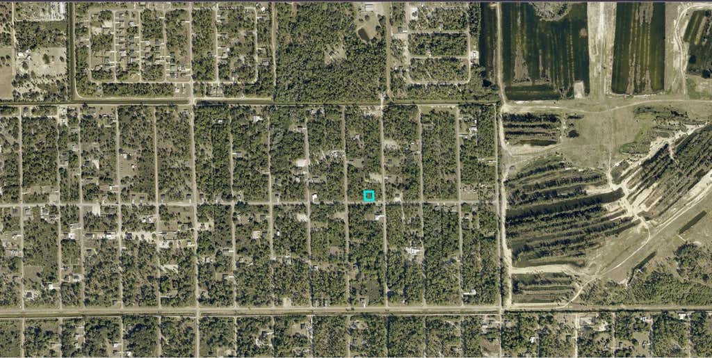 Photo of 805 E 17th Street, Lehigh Acres, FL 33972 (MLS # A4700956)