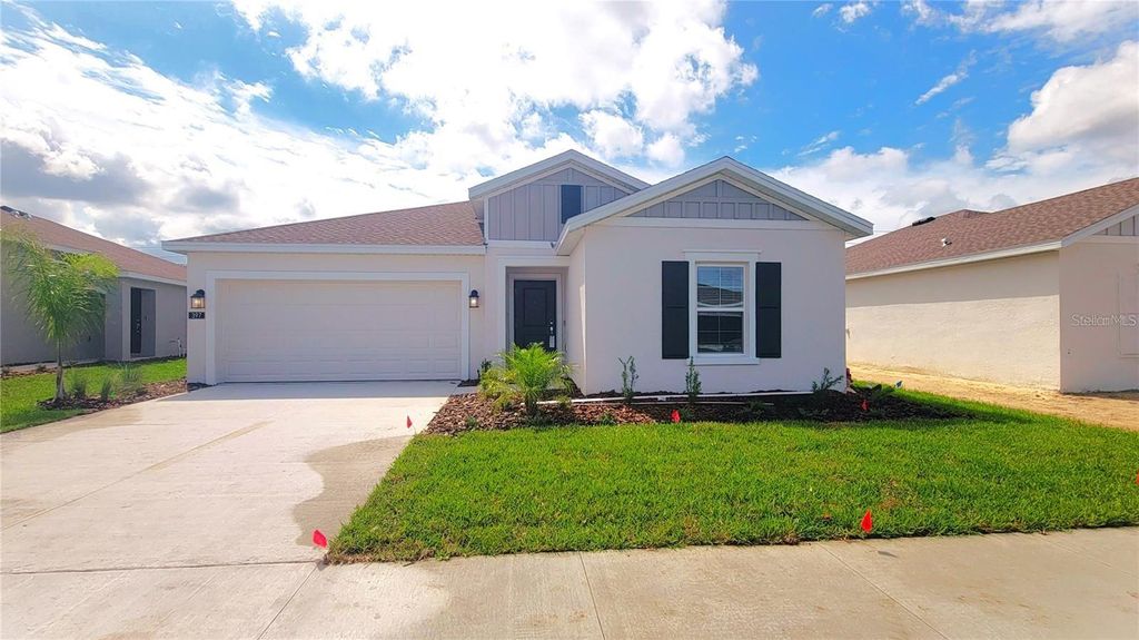 Photo of 397 Singing Sands Circle, Lake Wales, FL 33859 (MLS # O6368015)