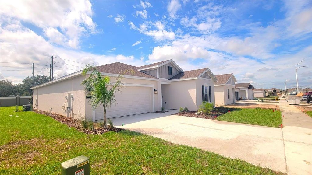 Photo of 397 Singing Sands Circle, Lake Wales, FL 33859 (MLS # O6368015)