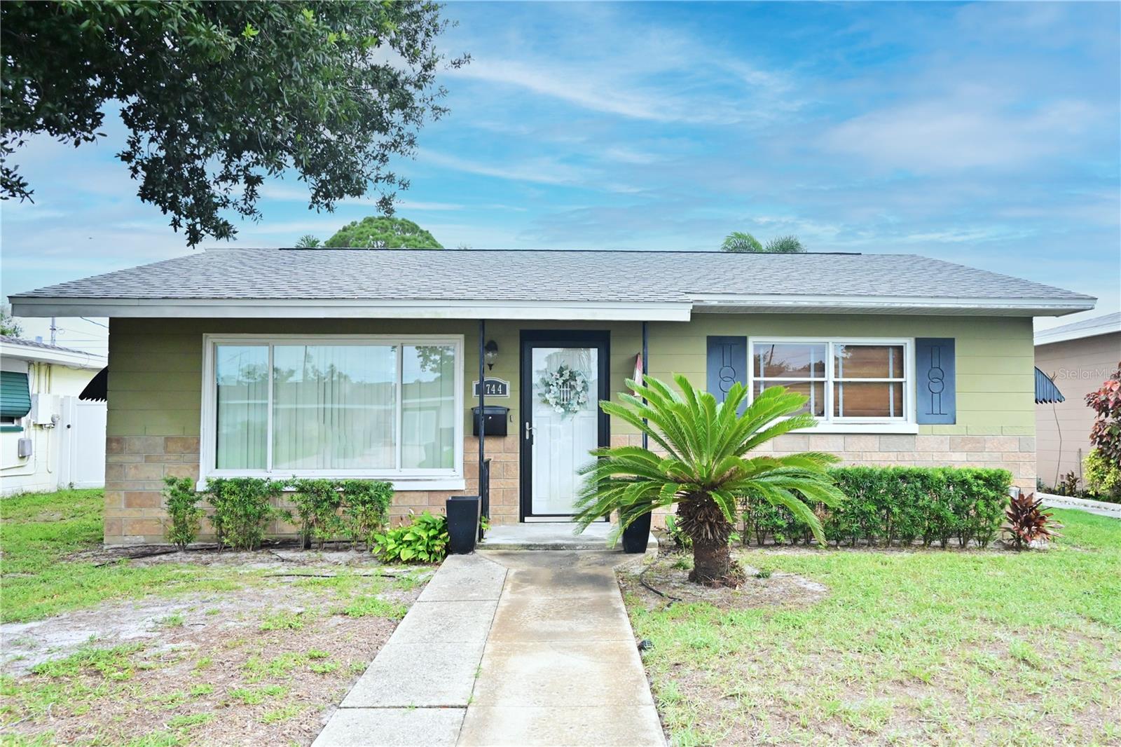 Welcome to this charming & versatile home nestled in a quiet St. Petersburg neighborhood. Offering 2 bedrooms, 2 full bathrooms, and a bonus room that easily serves as a home office, hobby room or potential 3rd bedroom.
Step inside to find real hardwood floors flowing through the living and dining areas. The kitchen features a beautiful glass and marble tile backsplash, Energy Star-rated dishwasher, and a refrigerator with built-in ice maker and water filtration system. Exit the door in the dining room to relax on the rear screened-in patio, perfect for enjoying Florida evenings mosquito-free. A connected laundry room with washer and dryer sits just off the porch for added convenience.
Ceiling fans in every room, central A/C and heat, and insulated double-pane windows provide year-round comfort. Plenty of storage space and closets galore!
The primary bedroom offers privacy with its own separate entrance, built-in wall A/C unit, and kitchen hookups—making it ideal for a mother-in-law suite or rental option. The primary bath features elegant marble tile and a walk-in shower, while the hall bath includes a shower/tub combo.
Irrigation system needs a little tlc but feeds from its own well- water your lawn for free! Rear carport with alley access. Shed and above ground pool in the backyard as well as plenty of deck space for grilling, entertaining and sunbathing. Water heater about 3 years old, Airhandler purchased in 2019, Roof installed in 2013. Schedule your showing today!