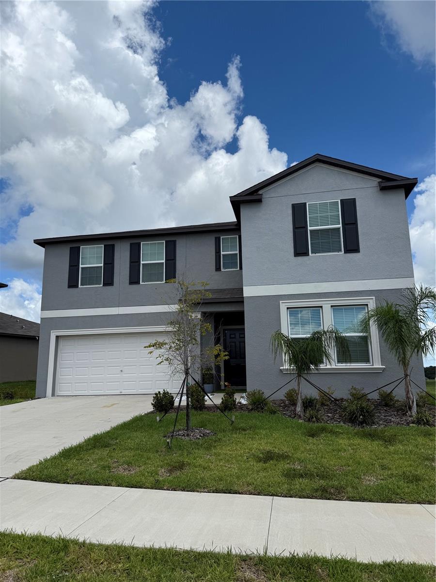 Welcome to this beautiful 6 bedroom, 3 bathroom and 2 car garage home. Conveniently located between Lakeland, Bartow, Orlando, and Tampa. Enjoy tile flooring in the main living and dining area, a stainless-steel appliance package, granite countertops in the kitchen. Discover the perfect blend of comfort and style in this charming home featuring two very spacious living areas- one on the first floor and another on the second floor. Enjoy ample space for relaxation and entertaining, making it ideal for families or anyone who loves to host. The community amenities are walking trails, playground and a stunning community pool. Call me now to schedule your showing…