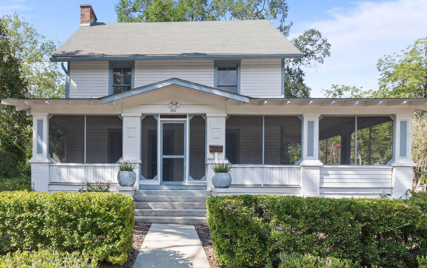 Well-loved Craftsman in the historic Duckpond neighborhood is on the market for the first time in 37 years! Located on a spacious corner lot with mature trees and plantings, this home features a wrap-around porch on the south, a wooden deck on the north and a patio area off the detached garage. Bring your restoration visions to life in this charming home with lots of potential room for expansion. On the ground floor, there are two covered porches under roof that could add heated square footage downstairs. Ideal for a primary bedroom and bath expansion. The second story features two bedrooms and a large bathroom with a cast iron tub. There is a stairwell leading to the fully-floored, third-story attic providing another opportunity for livable square footage. Historic heart pine wood floors and large windows throughout. The kitchen features solid wood cabinets and stainless steel appliances. The detached garage and covered patio were added in 2003. The home also features a 2015 roof, 2022 Trane HVAC and 2024 water heater. Thoughtful upgrades over the years include electrical and plumbing updates, and a fully-enclosed crawlspace. This one won't last long. Come take a look!