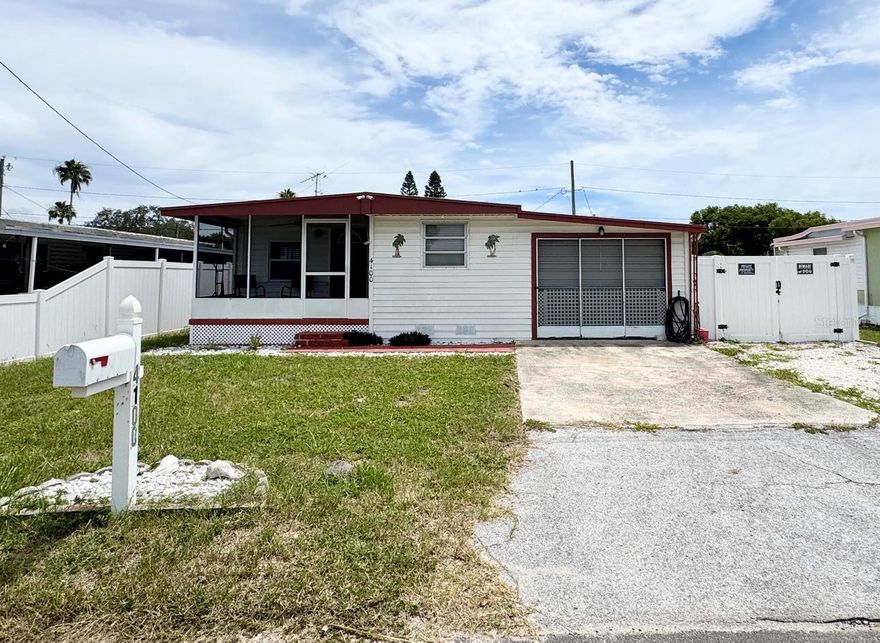 **NEW PRICE**On it's own land and move-in ready!

Come live the Florida lifestyle in this spacious and versatile 3-bedroom home that offers so much more than meets the eye! From the moment you step onto the charming screened-in front porch, you'll feel the welcoming, laid-back vibe this property exudes. Inside, a generously sized, freshly painted living room and a large dining area provide the perfect space for relaxing or entertaining. The kitchen has a tiled backsplash and plenty of cabinetry. The primary bedroom is extra large with direct access to the back porch. Bedroom 2 and 3 have built in dressers and the third bedroom also has it's own private 1/2 bath!

Step outside and discover your own private retreat! Cool off in the above-ground pool, lounge on the surrounding deck, or rinse off in the convenient outdoor-access shower and toilet located in the separate laundry area—perfect for pool days or muddy playtime.

The attached one-car garage with workshop (cooled by window unit), and additional side parking offer endless potential: boat storage, hobby space, extra vehicles, or even a dog run. And don’t miss the adorable backyard shed with its own front porch, electric, and window—ideal as a playhouse, she-shed, home office, or creative studio.

A/C (2018) and classy white vinyl fencing for privacy and peace of mind, this home adapts to your lifestyle—whether that means entertaining, working from home, gardening, crafting, or simply soaking up the sun. With multiple flexible spaces inside and out, the possibilities are endless!

**SELLER WILL PREPAY HOA DUES FOR ONE YEAR** with full price offer!  Don't wait...come see it today!