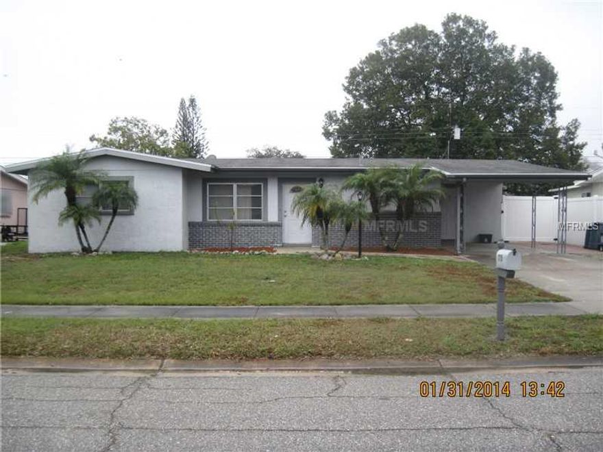 Charming home GREAT for 1st time home buyers or investors. 1328 sq. ft. 2 Bedroom home with large Jack & Jill bathroom, which is great for sharing. The home also has a extra room for a den, playroom or office.There is a separate Large Landry Room off of the carport with plenty of storage space. Backyard is completely filled in with pavers, comes with well equipped swing set for family fun & also a large workshop for you home improvers!!! This home is in walking distance to Ed Smith Stadium, minutes to downtown and Sarasota's Famous Beaches. Price reflects a recent appraisal & home inspection.