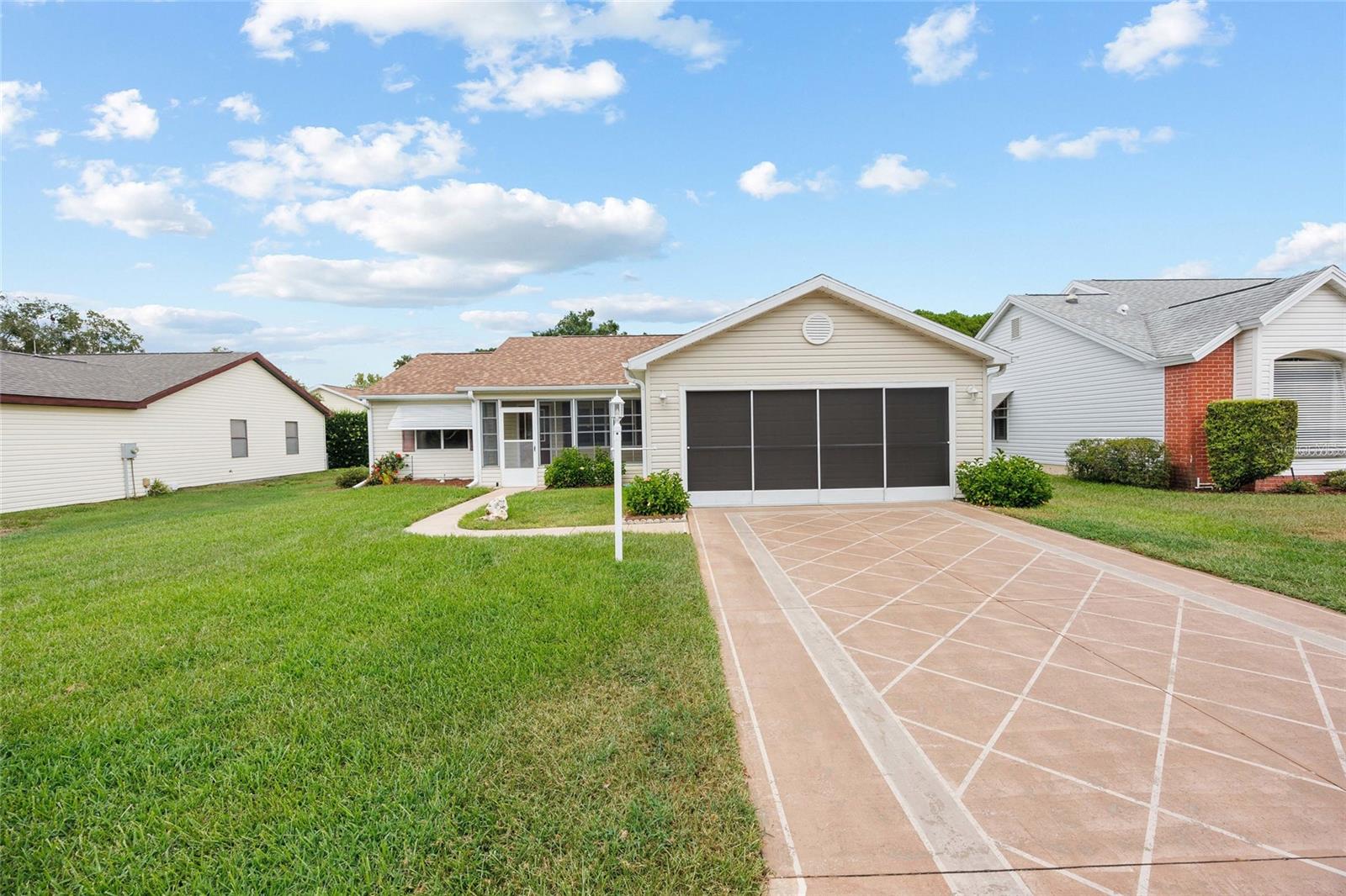 Welcome to this beautiful Designer home model located at 729 Bolivar Street in the heart of The Villages! This 2 bedroom, 2 bath home with a 2-car garage offers the perfect blend of comfort, style, and worry-free living. You’ll enjoy peace of mind with a NEW ROOF (2023) and NEW A/C system (2024) already in place.
Step inside to find a bright and open floor plan enhanced by elegant crown molding in the main living areas. The spacious living and dining spaces flow seamlessly, making it easy to entertain family and friends. The enclosed lanai, complete with heat and air, provides the perfect year-round retreat—ideal for enjoying morning coffee, reading, or relaxing after a day on the golf course.
The kitchen offers ample cabinet and counter space, with easy access to the dining area for convenience. The primary suite features a large walk-in closet and a private bath, while the guest bedroom and bath ensure your visitors feel right at home.
This property is truly low-maintenance with NO BOND and NO maintenance assessment—a rare find…and it’s coming fully furnished! The location is outstanding—close to championship and executive golf courses, recreation centers, pools, shopping, dining, and all the fun The Villages is known for.
Don’t miss your chance to own this well-maintained Designer model in one of the most desirable areas of The Villages. Schedule your private tour today! Seller is requesting all offers be submitted by August 17, 2025. At that time, all offers will be reviewed at once.