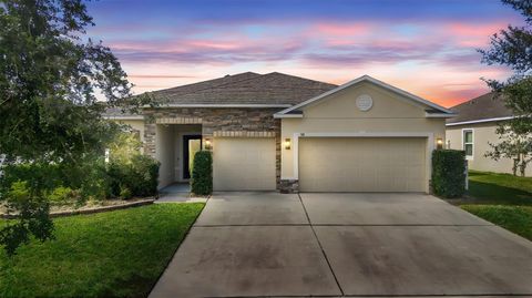 Photo of 318 Briarbrook Lane, Haines City, FL 33844 (MLS # O6360999)