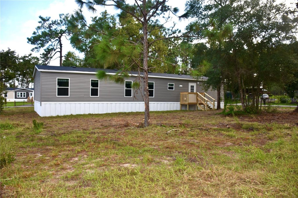 Photo of 25300 Mardon Circle, Paisley, FL 32767 (MLS # G5118254)