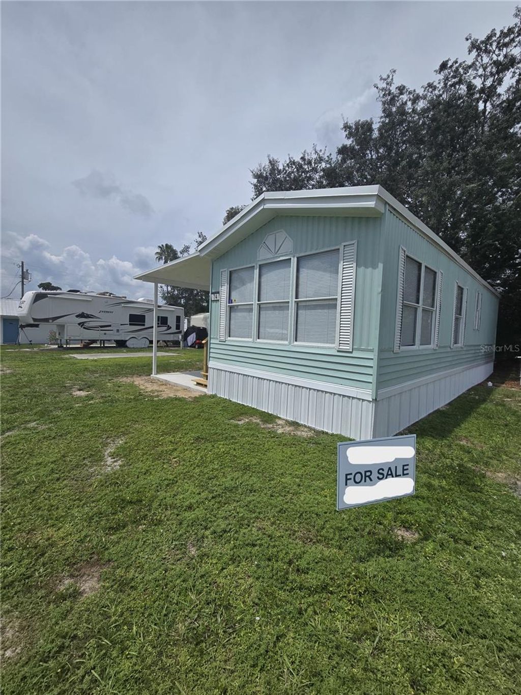 Photo of 4105 Us Highway 27 S #Lot 74, Sebring, FL 33870 (MLS # O6355688)