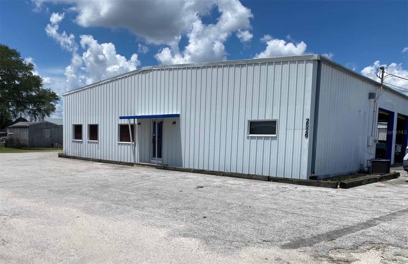 Looking for a great business site, well look no further. This one has lots of wonderful features. A new metal roof was recently installed. There is also 360 degree access around the entire building, which also is drivable. The building has 3 phase power already installed. There are a total of 12 overhead doors, 10 that are 10 feet in height and 2 that are 12 Feet in height. As you walk into the entrance you are greeted with a reception area that has multiple offices and has central air. Also off to the side there is an executive office complete with a full bathroom. There are a total of 3 restrooms: 2 for customers (men and women, and 1 full bathroom with shower in the private room) The location of the property is outside of the city limits and has operated for almost 30 years as an automotive repair business. Some of the equipment is also available for an additional fee. The owner is retiring from this well established business. This is a wonderful opportunity to own.