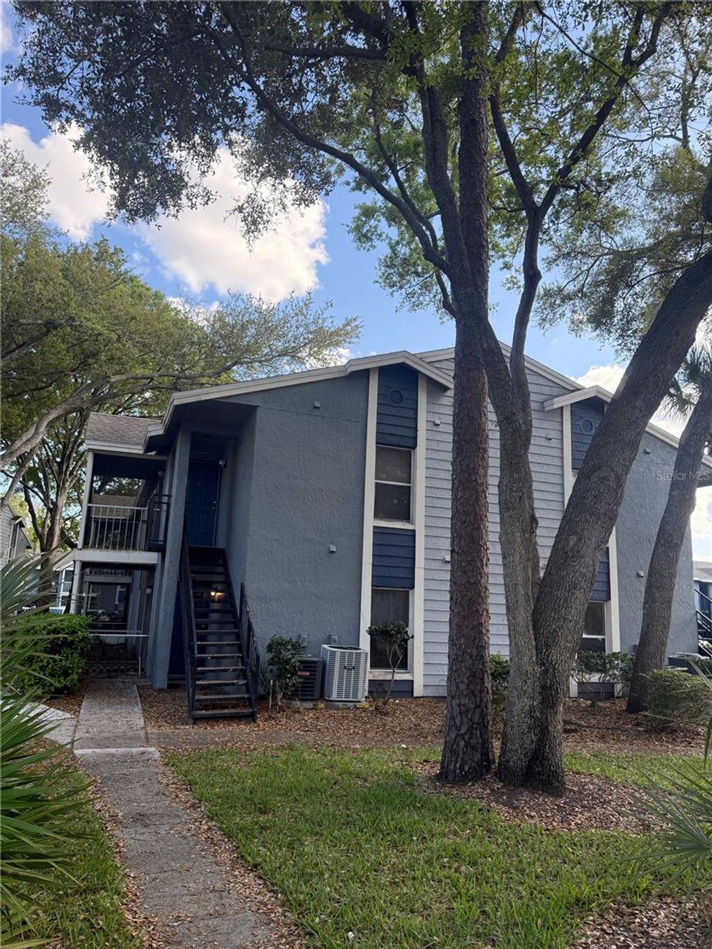 Photo of 3827 Bay Club Circle #103, Kissimmee, FL 34741 (MLS # S5146346)