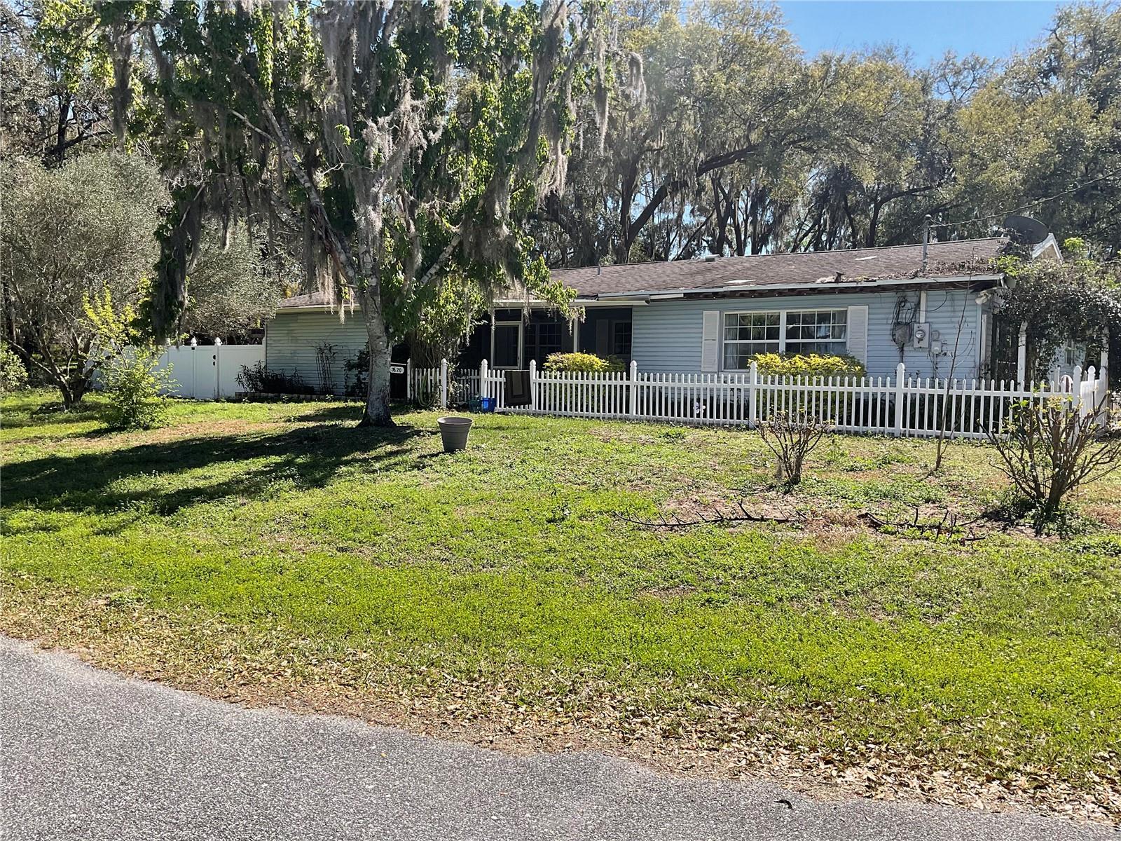 Great Investment Opportunity! This corner lot, 2 bedroom, 2 bath, double car garage offers a spectacle lakeview of Beautiful Lake Hernando. Large kitchen features Butcher Block counter tops, tiled back splash, eat at counter, dining room, living room, and family room. Master bathroom features tiled walk-in shower and double vanity sinks. Guest bathroom features tiled shower/tub combo. Large back yard with privacy fence back and two storage sheds. Home is walking distance (0.1 mile) to Hernando Beach & Community Park, Post Office or Citrus County Fire Station #5. Medical facility is (14 min) drive and shopping (10 min) drive. Current owner purchased house with foundation settling issues and repairs were made. Engineer report on file and available to potential buyers. Roof was damaged during previous hurricane season and Seller is not offering concession for repairs.
