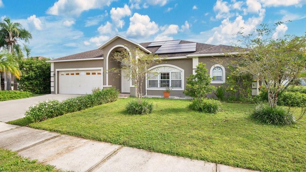 Photo of 5203 Jasmine Trace Lane, Kissimmee, FL 34758 (MLS # O6313316)
