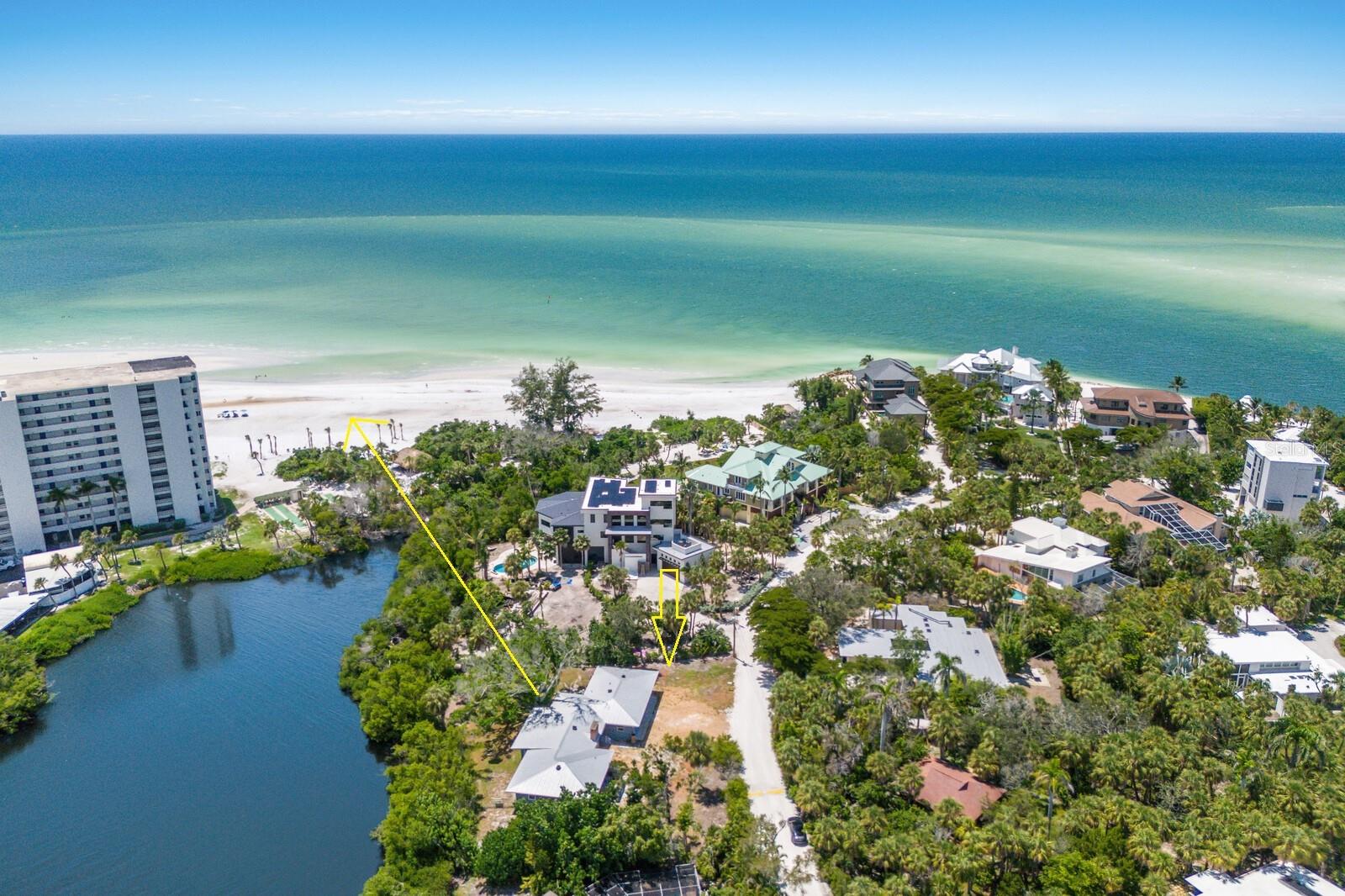 Sandy Hook stands as a rare fusion of history, architecture, and coastal living. Sandy Hook is Siesta Key’s Premier Gulfside Community. Just north and west of Siesta Village, Sandy Hook is more than a neighborhood—it’s a legacy. Widely regarded as one of the most prestigious, desirable, and coveted communities on Siesta Key, it sits on a stretch of coastline where Gulf breezes carry stories of visionaries and architects who defined modern Florida living.
Sandy Hook, with it’s private entrance, features a private beach, the epitome of the ultimate island lifestyle. This oversized Southern Exposure Lot of 38,435 square feet lagoon-front lot offers endless possibilities—reimagine and remodel the existing home or tear down and build your dream island retreat with Gulf and beach views. With direct frontage on the lagoon, you can design your own dock or kayak launch for seamless access to the water. Though the home was impacted during the storm, the opportunity here is extraordinary: remodel what’s here or start fresh on this rare parcel in one of the most coveted locations on Florida’s Gulf Coast. Sandy Hook offers not just a property, but a lifestyle—private beach, architectural pedigree, and island living at its very best.
The location is simply unbeatable. Tucked away in Sandy Hook’s private enclave with its own white-sand beach, you’re just 0.5 miles to Siesta Key Village, where hip and funky boutiques mingle with high-end shops like Lilly Pulitzer and Tommy Bahama. Grab groceries at Morton’s Gourmet Market, a treat from Kilwins Ice Cream, or fill up at the island’s own Circle K gas station—proof that you never have to leave the Key.
When you do venture out, world-famous Siesta Beach/Crescent Beach is only 1.6 miles away. You’re also just 4.8 miles to Sarasota Memorial Hospital, 6 miles to downtown Sarasota, 10 miles to SRQ International Airport, and 14 miles to UTC Mall.
The appeal of Sandy Hook extends beyond lifestyle—this enclave is steeped in mid-century modern heritage, shaped by pioneering architects whose influence still defines the community today.
For those who appreciate mid-century modern design, it’s nothing short of a pilgrimage—an opportunity to own a piece of one of America’s most architecturally distinguished seaside neighborhoods.
A Rare Mid-Century Modern Treasure, Sandy Hook is not just a neighborhood—it’s a living museum of design. Established in the early 1950s by pioneering female architect Mary Rockwell Hook, the community was envisioned as an “incubator for innovative architects.” It became the canvas for the Sarasota School of Architecture, a mid-century modern movement celebrated around the globe.