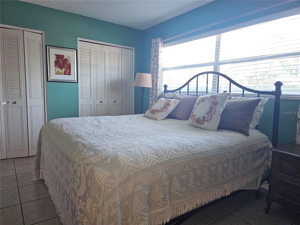 Photo of 2525 W Bay Drive #A13, Belleair Bluffs, FL 33770 (MLS # TB8498195)