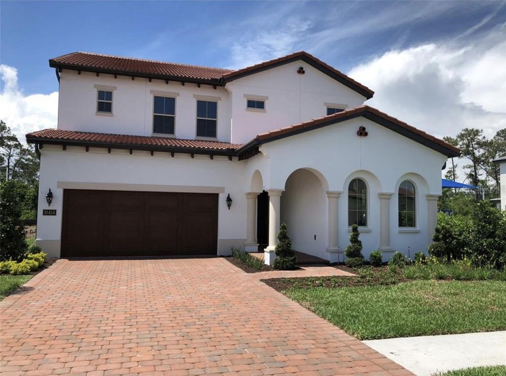 Photo of 10414 Royal Cypress Way, Orlando, FL 32836 (MLS # O6379980)