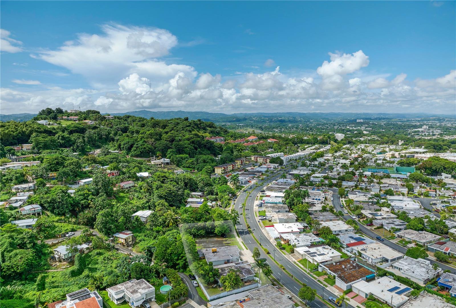 One of a kind opportunity to own three unique properties with a central location in Guaynabo. Offering a total of 3,864 interior Sq. Ft. spread across 2 separate structures, in addition to almost a quarter of an acre of shovel-ready land to serve as the ideal canvas for your vision. Versatile and primed for residential development, all three properties can be purchased together or separately to be transformed into your dream project. 1 Santa Ana | 588 Sq. M. 2 Santa Ana | 540 Sq. M. 3 Santa Ana (Land) | 961.70 Sq. M. - Total Combined Lot Size | 2.089.70 Sq. M. Guaynabo is known as one of the island's most coveted communities. Near highly-regarded schools such as Baldwin, Parkiville and Marista. Also within close proximity to Caparra Country Club and multiple shopping venues, including San Patricio Plaza and Garden Hills Plaza. A short drive away from San Juan, Isla Verde and Dorado.