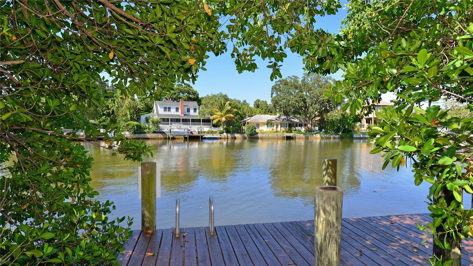 BAYOU FACING TURNKEY CONDO IN RESORT STYLE COMPLEX CENTRAL TO DOWNTOWN SARASOTA. Enjoy Florida living at its best in this tranquil fully furnished condo facing the beautiful Hudson Bayou waterway. This home is located in Central Park II, an amenity-rich PET FRIENDLY community with a FLEXIBLE one-month minimum RENTAL policy. This fully equipped and well-maintained unit is move in ready and provides GROUND FLOOR ACCESSIBILITY with no steps or stairs. Lovely PARTIAL WATER VIEWS and lush landscaping are enjoyed from the private screened-in PATIO. The property offers a COMMUNITY DOCK, GRILLS, SWIMMING POOL, HOT TUB, FITNESS CENTER,TENNIS/PICKLEBALL COURTS, clubhouse, easy parking, and secure bike and kayak storage with a REASONABLE HOA FEE. The location is exceptional with a full range of dining, market, theatre, and shopping options offered in downtown Sarasota and nearby Southside Village. Additionally, the Bayfront Park, Marina Jack, Selby Gardens, Payne Park, the Legacy Trail and so much more are less than a mile from the front door. The Lido Key and Siesta Key villages and beaches are also easily accessible by bike, car, or trolley. Make the Sarasota dream your reality with the perfect place to call home. OWNER FINANCING AVAILABLE for qualifying buyers. PRICE REDUCED.
