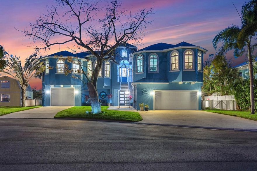Tucked away on a quiet cul-de-sac in Riverview, this stunning custom-built waterfront home delivers exceptional design, modern upgrades, and breathtaking western views of the Alafia River stretching out to Tampa Bay.
Positioned on the second level to maximize the scenery, the main living area showcases an open-concept layout with ceramic wood-look tile, coffered ceilings with crown molding, and expansive sliding doors that lead to a balcony overlooking the water. The living room is both inviting and functional, complete with custom built-ins, an electric fireplace, and seamless access to a stylish wet bar featuring a sink, beverage refrigerator, and abundant cabinetry—ideal for entertaining.
The kitchen is thoughtfully designed with white cabinetry, Cambria stone countertops, a large island with seating, and a spacious walk-in pantry. Premium appliances include a Sub-Zero refrigerator, built-in wall oven and microwave, and an induction cooktop, offering both performance and efficiency. Just steps away, the formal dining area provides the perfect setting for gatherings.
The split-bedroom floor plan ensures privacy, with the primary suite situated on one side of the home. This serene retreat features a multi-tray ceiling with crown molding, private access to a screened balcony, and an en-suite bathroom offering dual sinks, extensive cabinetry, and a walk-in shower with multiple shower heads. Dual walk-in closets provide generous storage. Bedrooms two and three are located on the opposite side, both equipped with ceiling fans and sharing a well-appointed bathroom with dual sinks and a tub/shower combination with a Jacuzzi-style tub.
Outdoor living is elevated with a solar-heated, saltwater pool and hot tub, complete with a water feature for added ambiance. A rooftop patio offers panoramic views of the Alafia River and Tampa Bay, creating a one-of-a-kind space to relax or entertain while taking in the surrounding natural beauty.
The ground level adds approximately 2,000 square feet of versatile flex space in addition to the two-car garage—perfect for a workshop, home gym, additional living area, or extra vehicle storage, with dual garage door access for convenience.
This home is loaded with high-end features and recent updates, including impact-rated double-insulated windows and doors, plantation shutters throughout, central vacuum, integrated generator, tankless water heater, water softener, and a dual-zone HVAC system (replaced December 2025). Bedrooms feature LVP flooring installed in 2024, and the exterior was freshly painted in December 2025. A Marantz/Sonos surround system enhances the living experience, and all Smart TVs, along with the washer and dryer (2022) convey with the sale of the home.
Additional highlights include 400-amp electric service and two Tesla chargers, offering modern convenience for electric vehicle owners.
For boating enthusiasts, the property is equipped with a private dock (2015), a 9,000 lb boat lift, a refurbished swing arm with a new cover and a floating dock added in 2018—perfect for launching jet skis and kayaks.
Offering a rare combination of thoughtful design, premium upgrades, and true waterfront living, this exceptional property captures the best of Florida living in a peaceful yet convenient location.