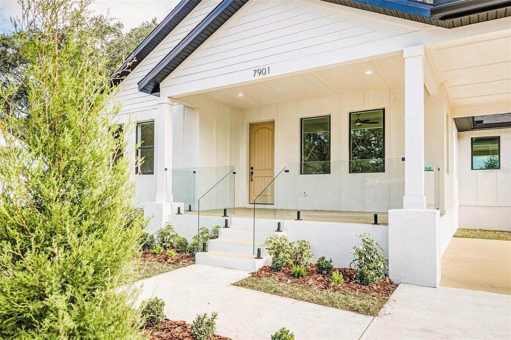 Photo of 7901 N Greenwood Avenue, Tampa, FL 33604 (MLS # O6443527)